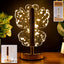 Crystal LED table lamp with butterfly-shaped acrylic shade and golden flakes