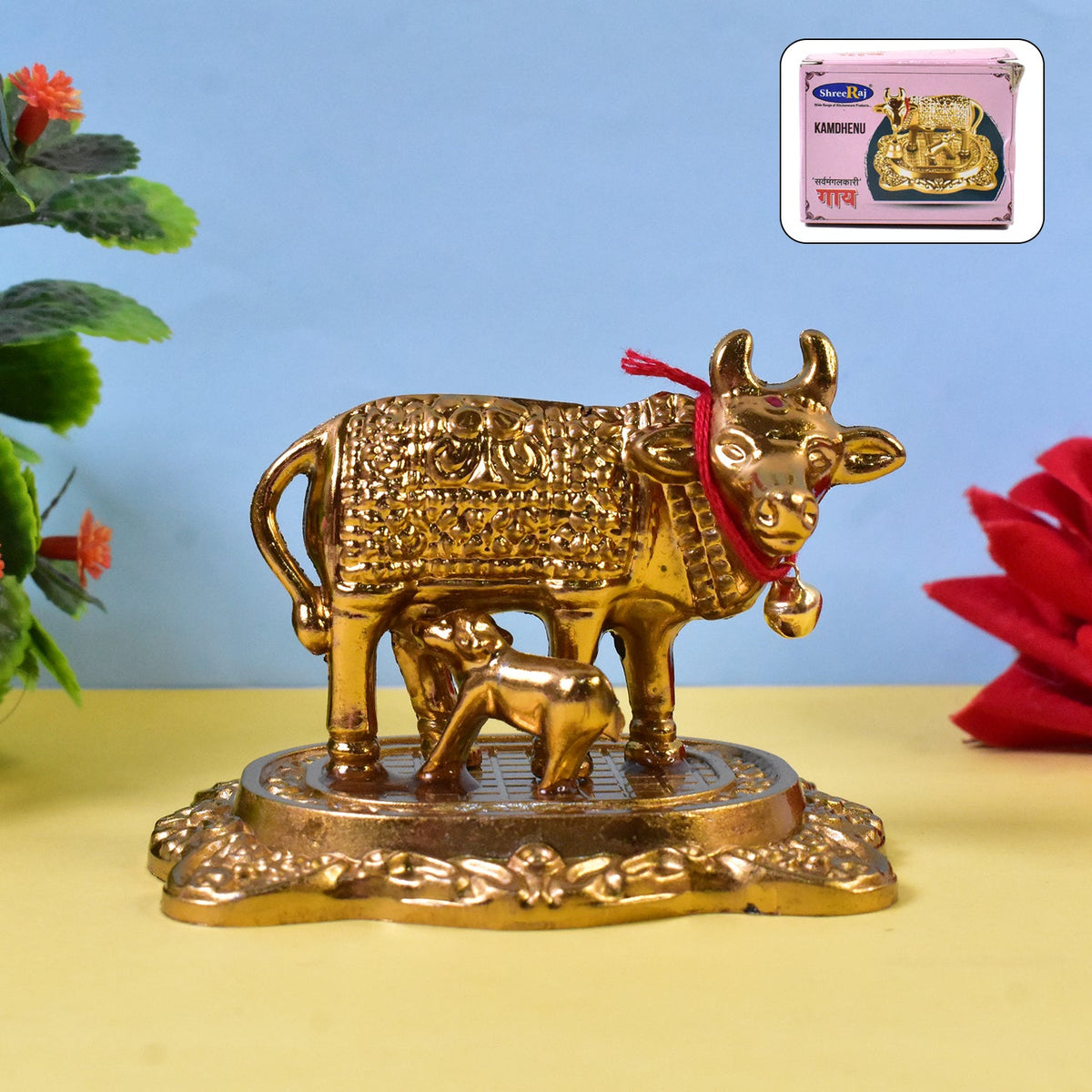 Golden metal Kamdhenu Cow with calf decorative showpiece idol Main image