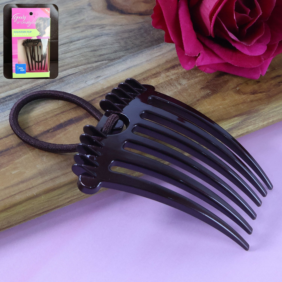 Ponytail Comb with elastic loop for easy, voluminous hair styling on a white background. Main image