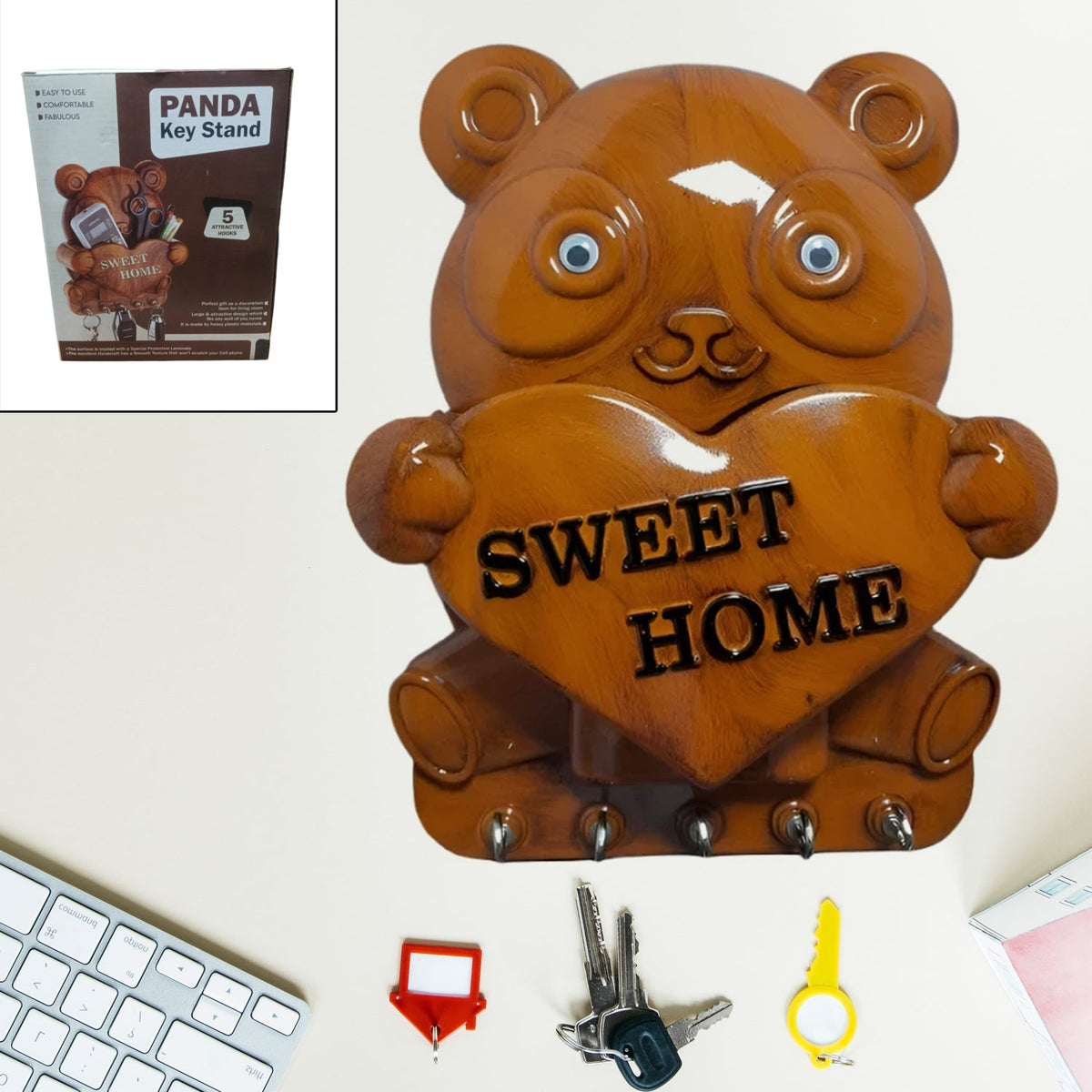 Cute plastic Panda Key Holder with five hooks mounted on a white wall. Main image