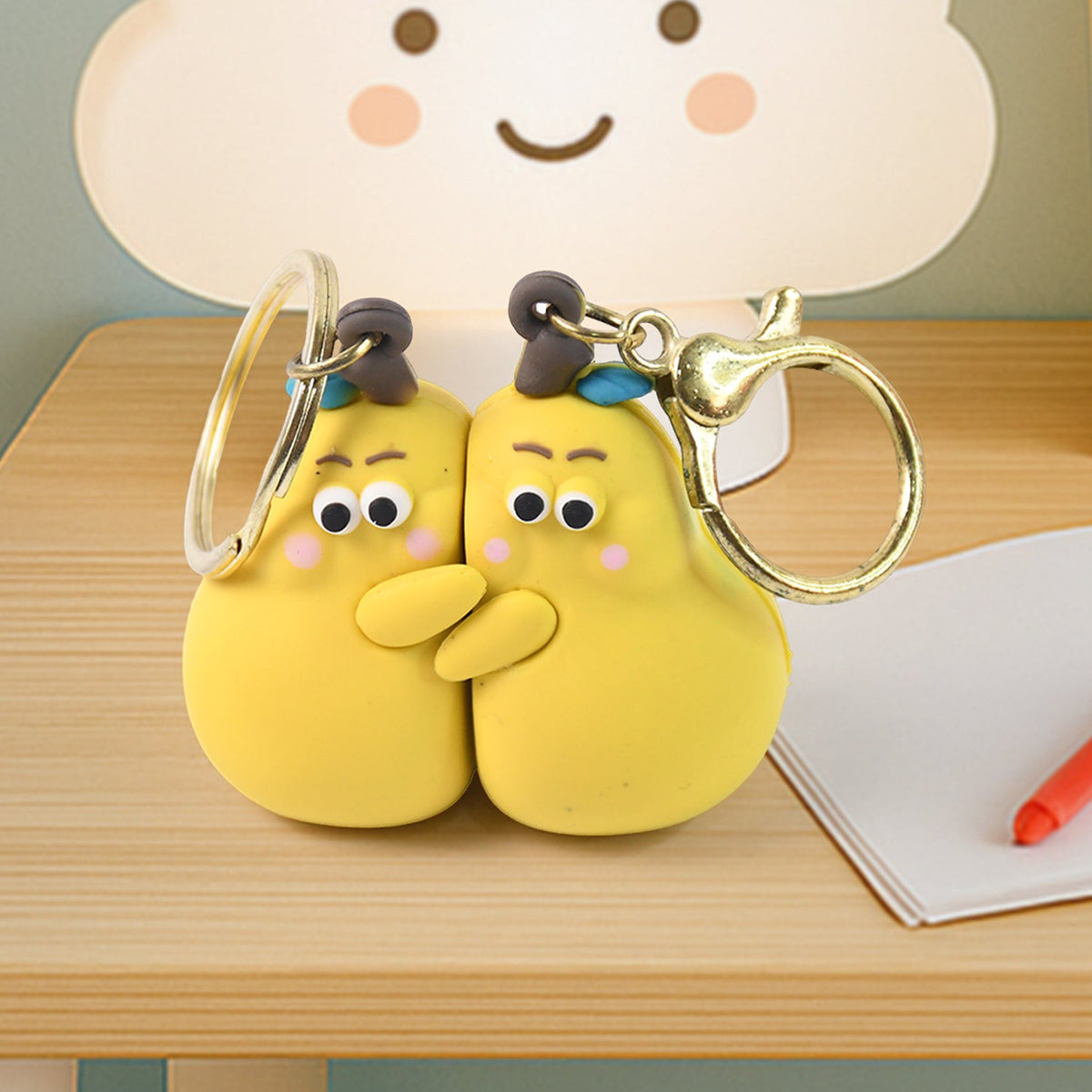 2-in-1 Cute Cartoon Couple keychain set with soft rubber hugging figures Main image