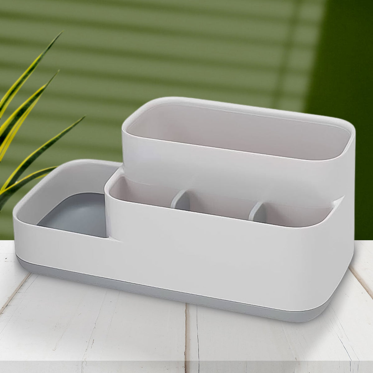 Plastic 5-compartment bathroom desk organizer holding various items. Main image