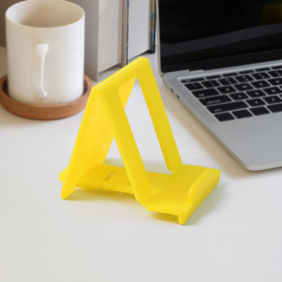 Adjustable foldable plastic mobile phone stand holding phone securely Main image