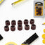 A close-up of the 10-piece Drum Polishing Kit with various sanding sleeves and mandrels.
