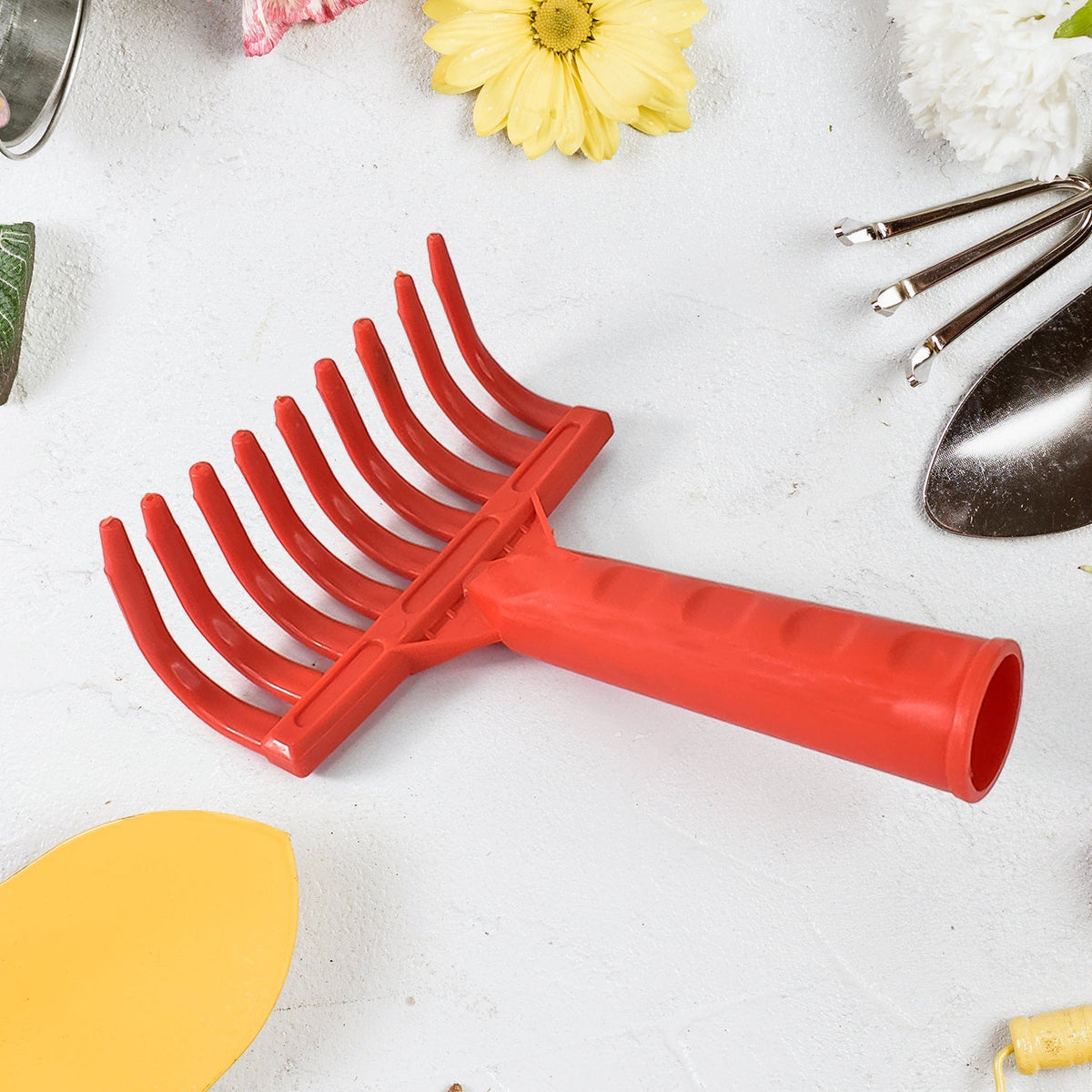 Ergonomic plastic garden hand rake with durable 9-tooth design Main image