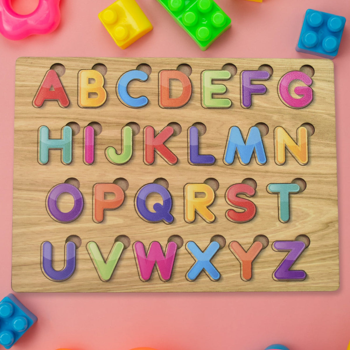 Wooden ABC Puzzle board with colourful letters and shapes for early learning. Main image