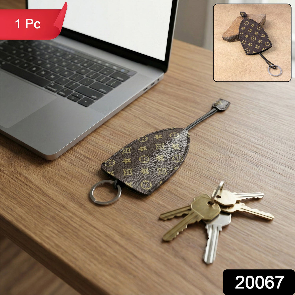 Designer-style keyholder with secure metal ring and patterned exterior Main image