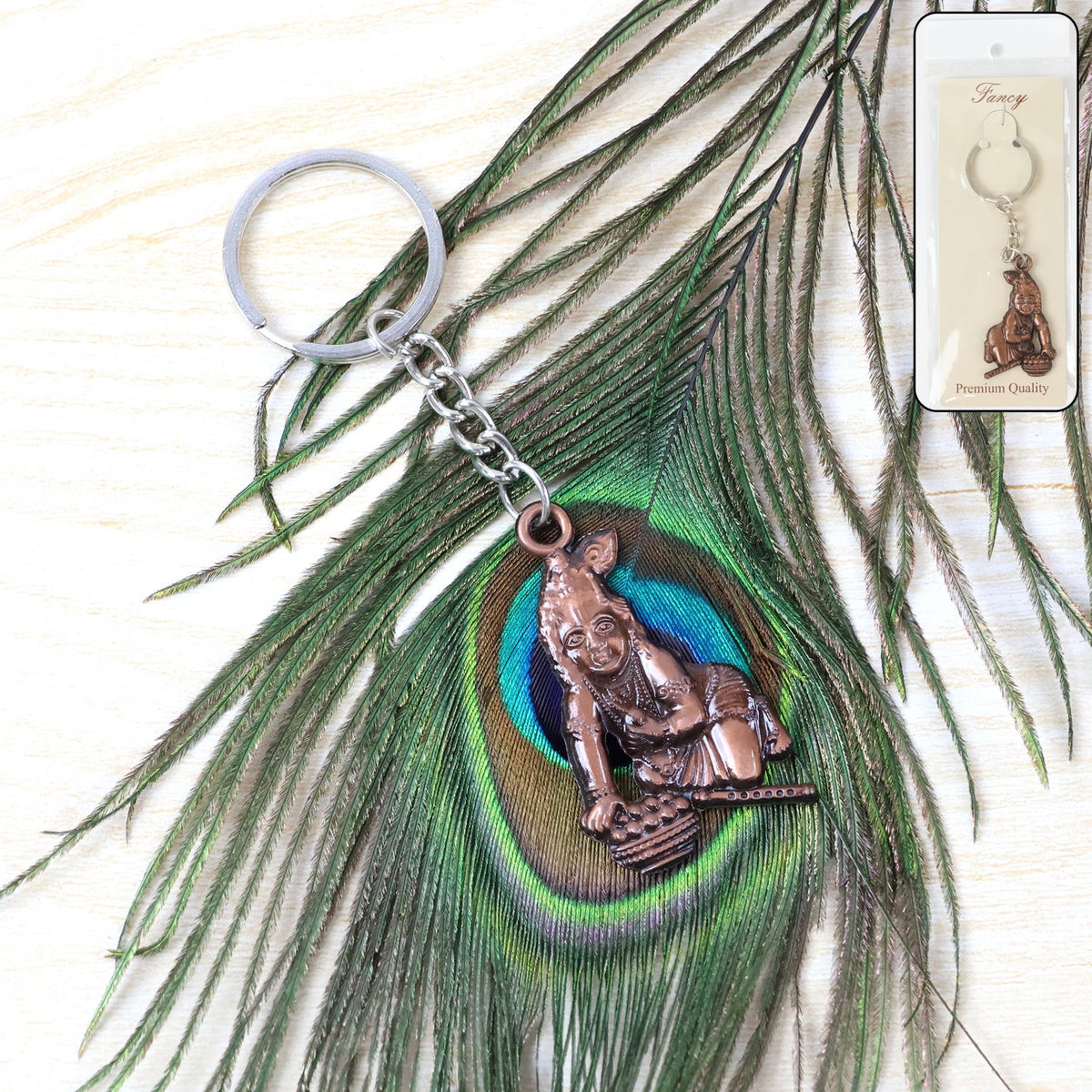 Bal Krishna keychain in crawling pose made from durable metal Main image