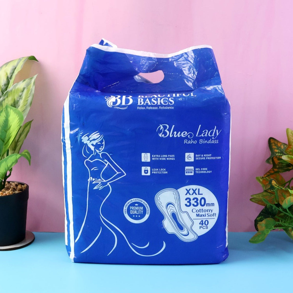 A close-up of a Sanitary Pads 330mm pack, highlighting the 'Blue Lady' branding and 'Extra Long' feature. Main image