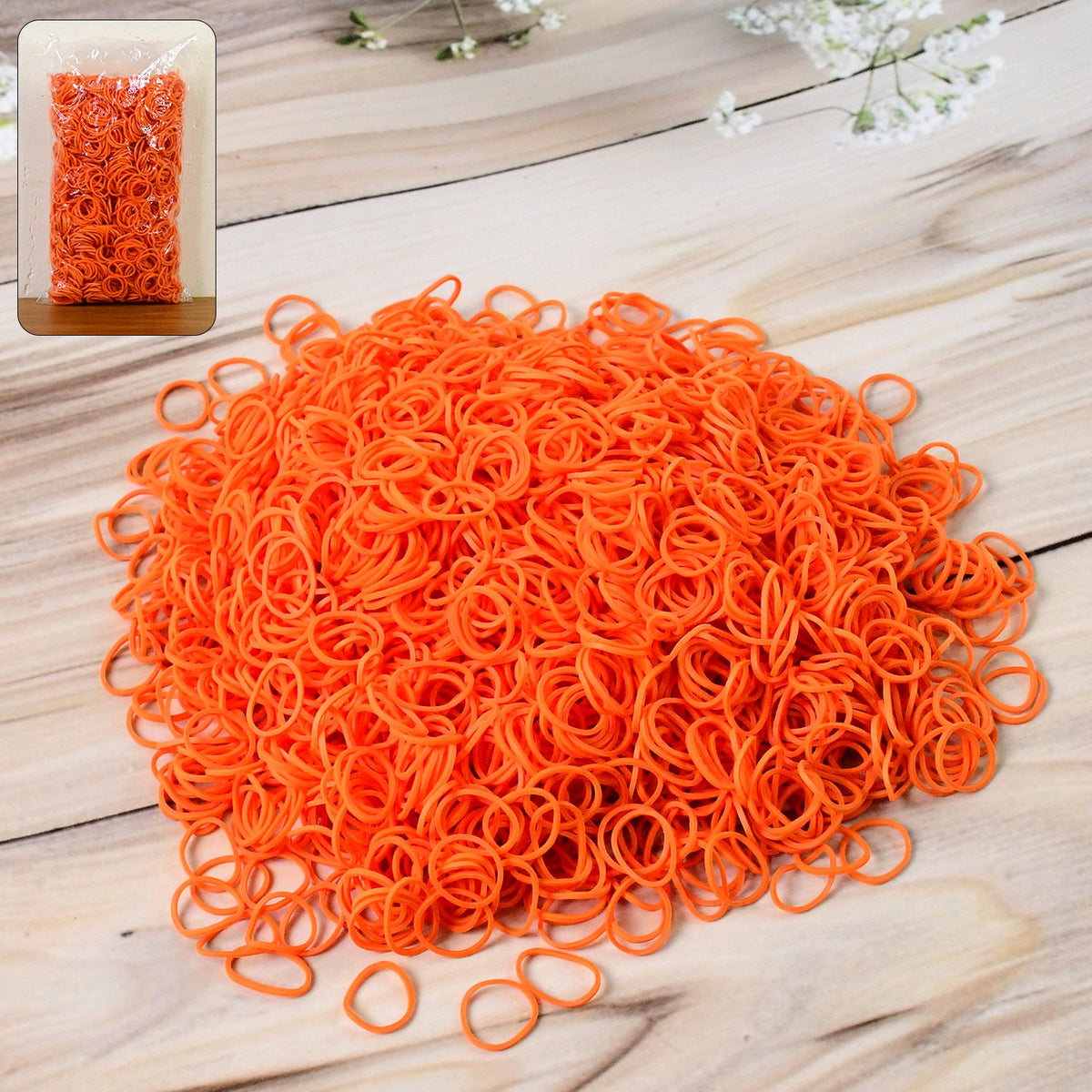 Strong orange elastic rubber bands tightly bundled Main image