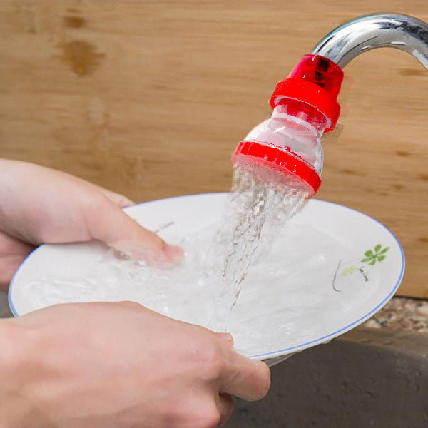 Compact plastic 360-Degree Shower Head attached to a tap, showing its flexible design. Main image