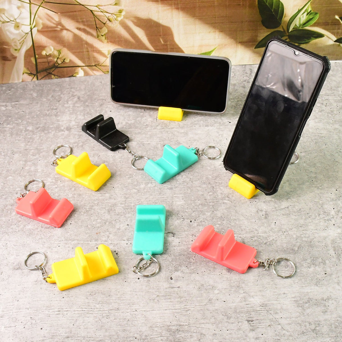 Compact 2-in-1 mobile stand keychain in assorted colors Main image