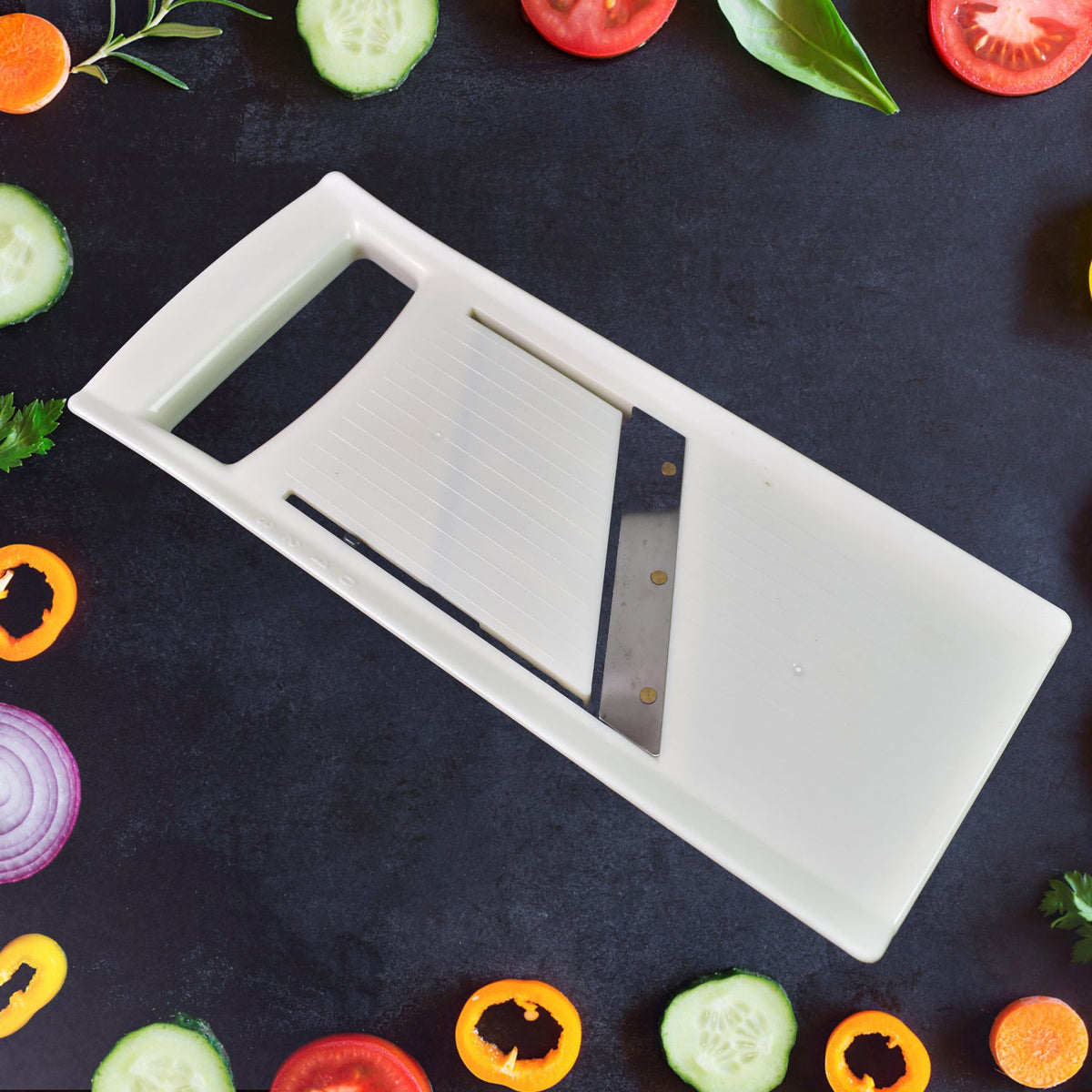 Adjustable vegetable slicer from Quickslice with its sharp stainless steel blade. Main image