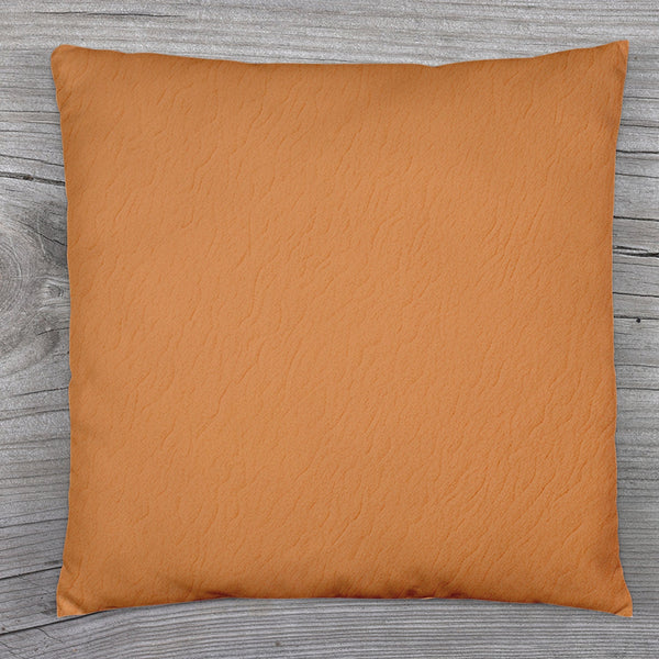 A beige couch pillow cover with an invisible zipper closure for easy use.