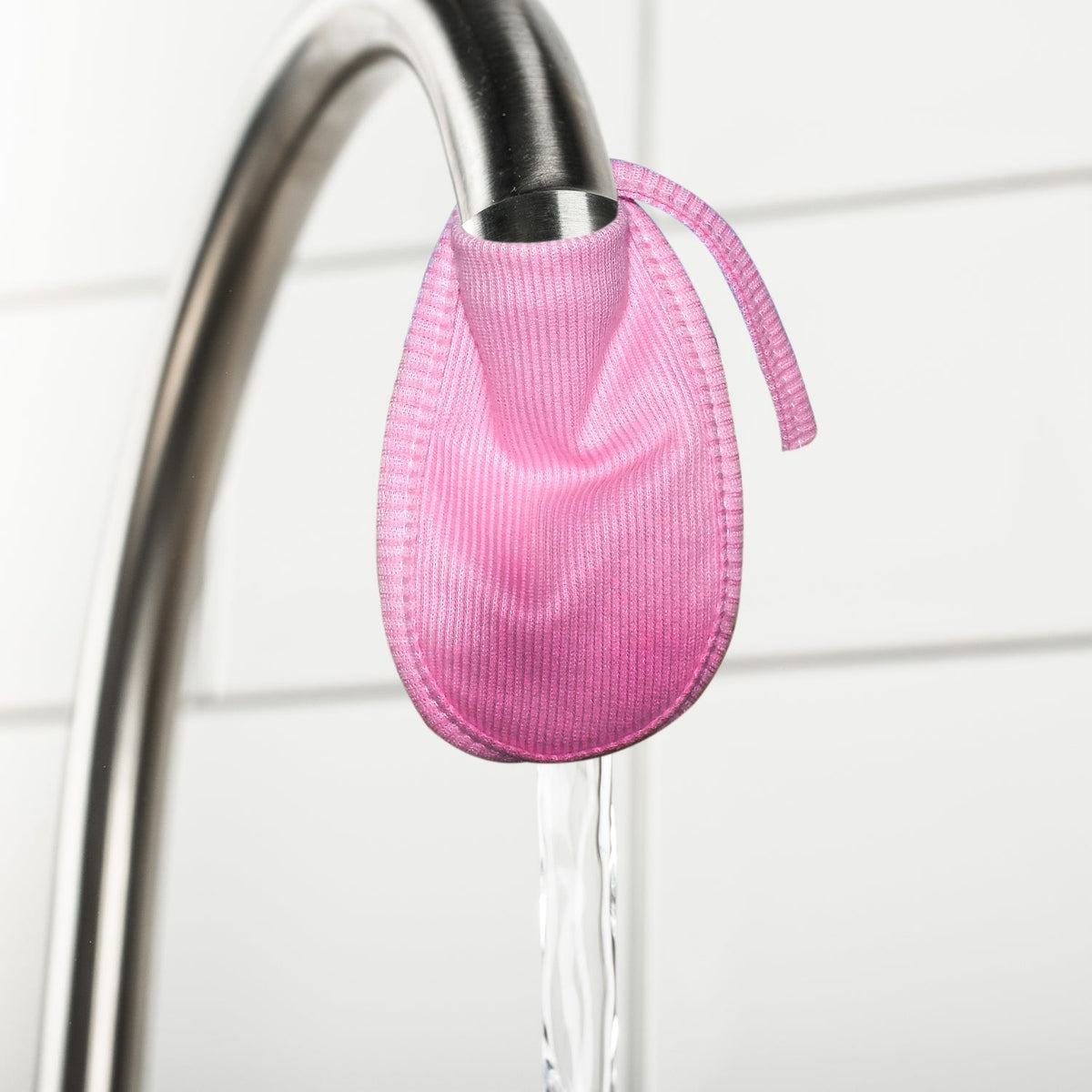 Double-layered cotton water filter cover protecting a faucet. Main image