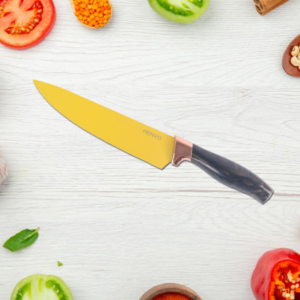 Yellow coated stainless steel blade close-up of kitchen knife set