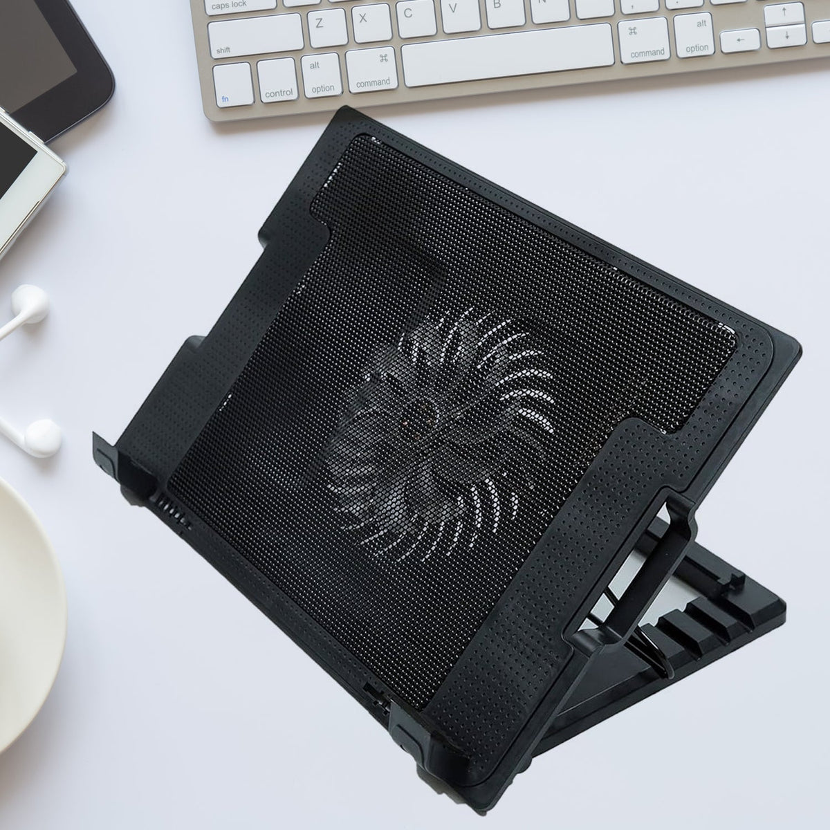Sleek black laptop cooling pad with fan and adjustable stand, ready for use. Main image