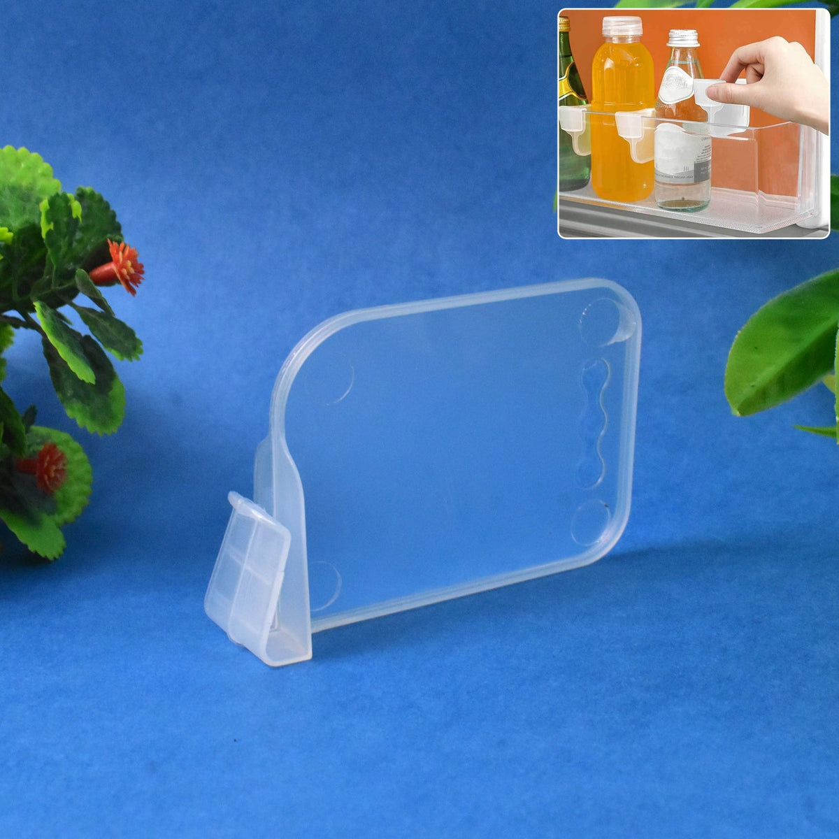 Adjustable plastic storage basket organizer neatly placed inside a fridge Main image