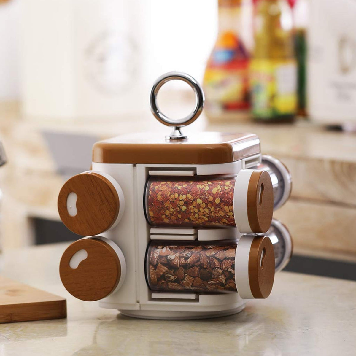 Ganesh Storewell plastic spice rack with 8 organized jars, featuring a revolving base. Main image