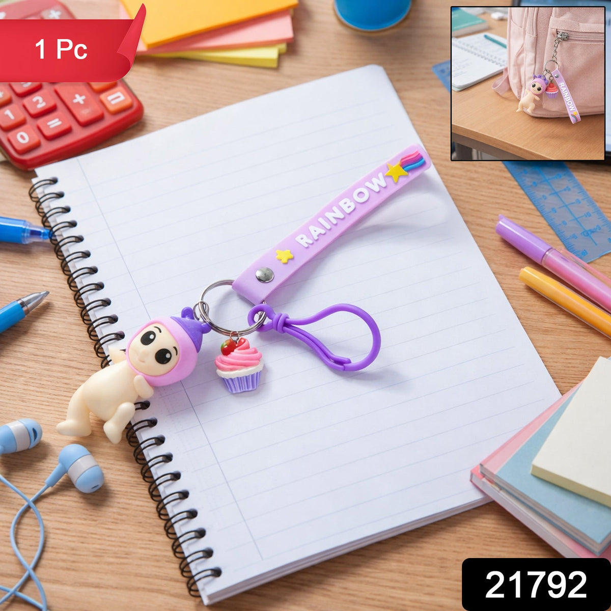 Doll Cupcake keychain with a bright rainbow strap attached to keys Main image