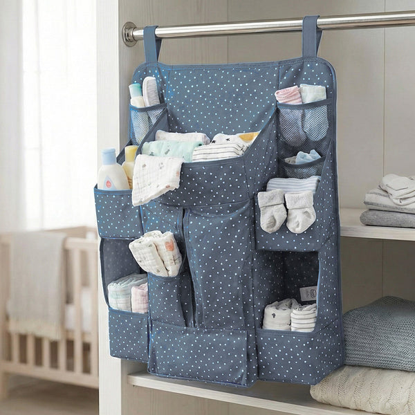 Close-up of storage pockets in baby care organizer for bottles and lotions