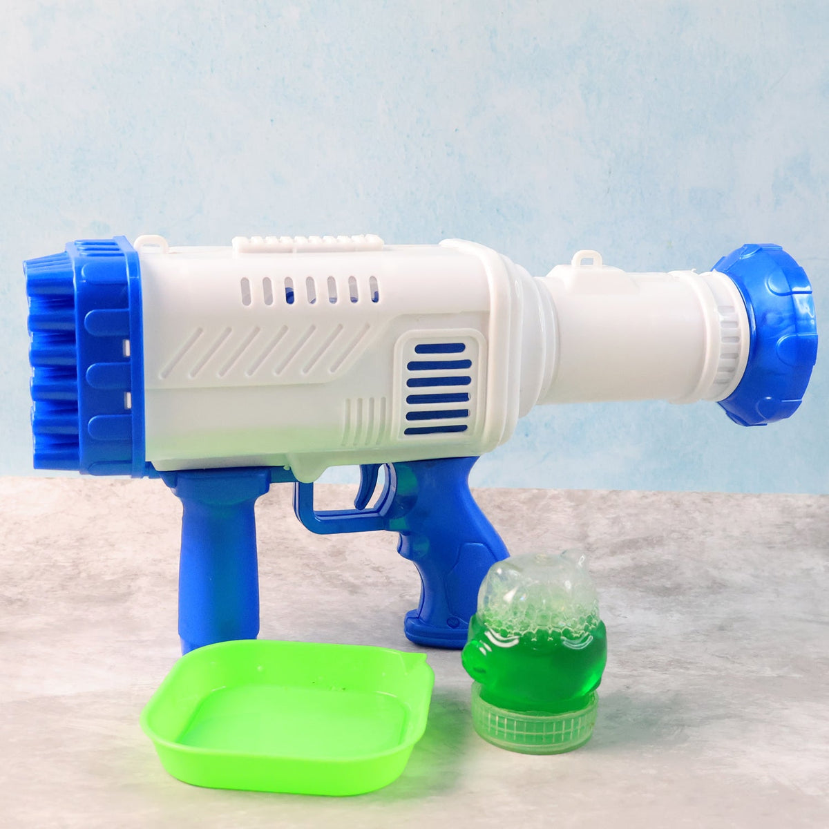 Children delight in a powerful 32-hole bubble gun creating a stream of bubbles. Main image