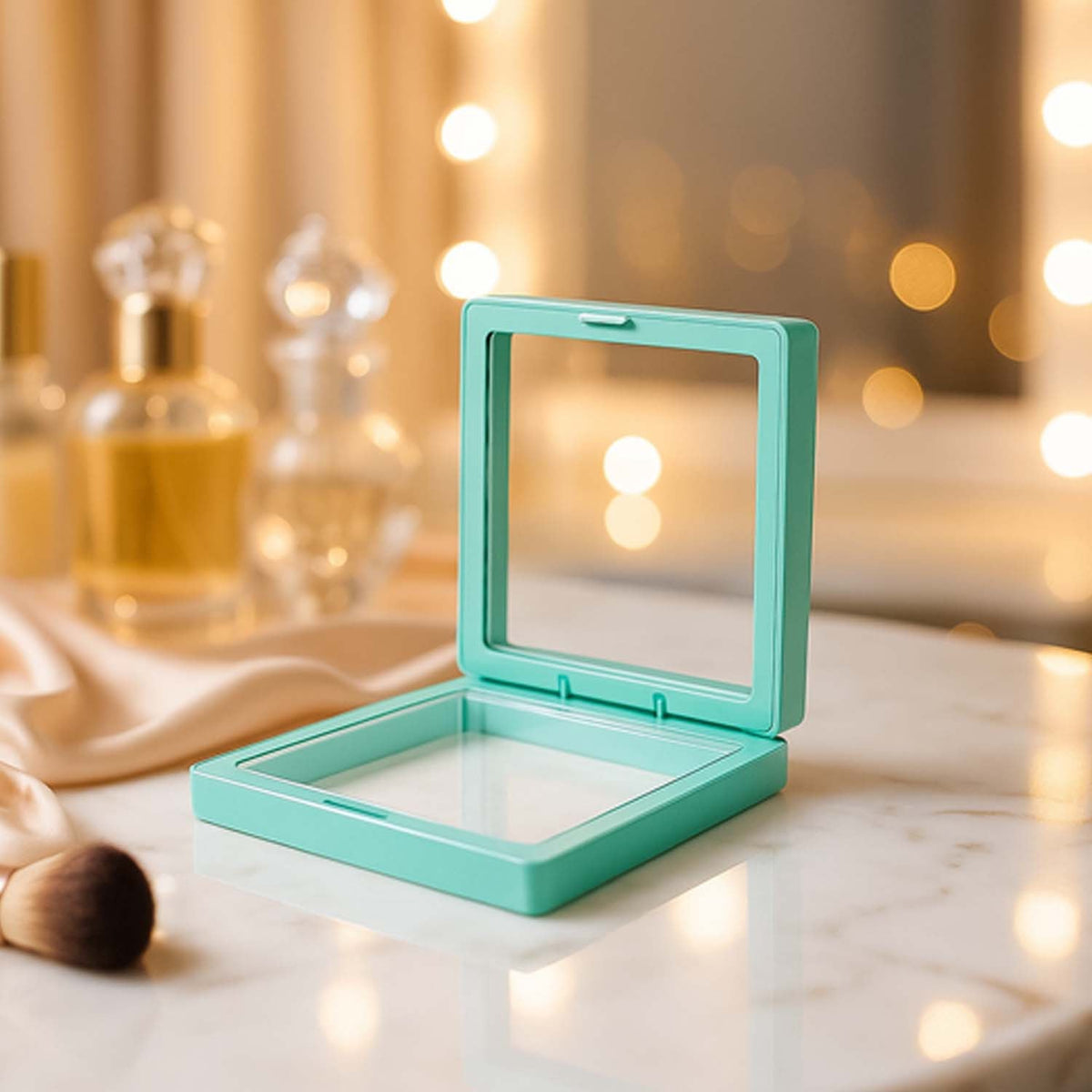 Transparent jewellery display box showing floating rings and earrings Main image