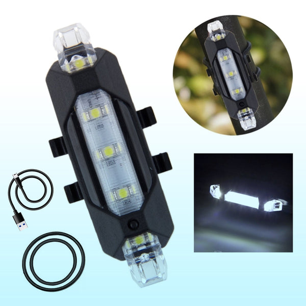 Rechargeable LED bicycle safety light mounted on a bike handlebar and seat post for visibility.