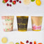 Colourful disposable paper cups in a set, ready for use.