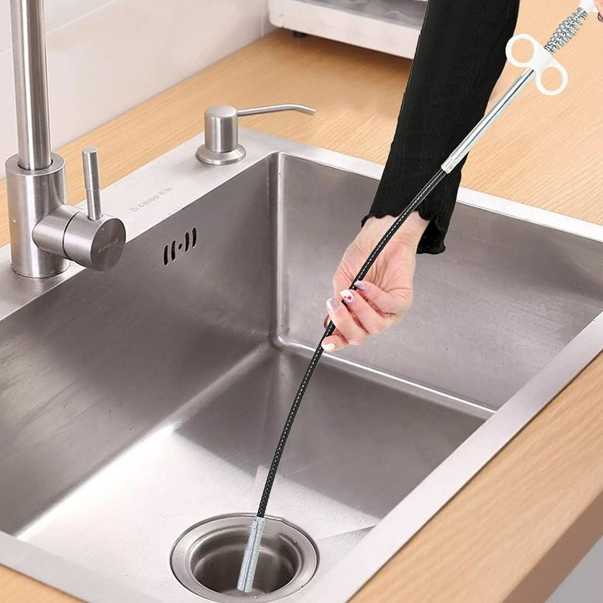 Close-up of a 90cm Drain Cleaner Tool with its flexible shaft and claw. Main image