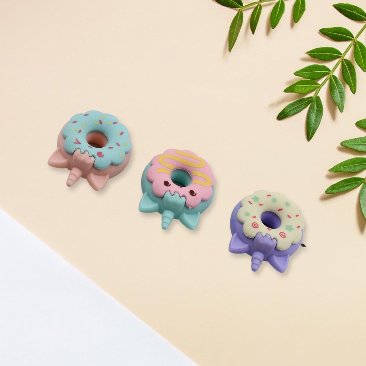 Vibrant 3pc Donut Erasers set for kids' school stationery. Main image