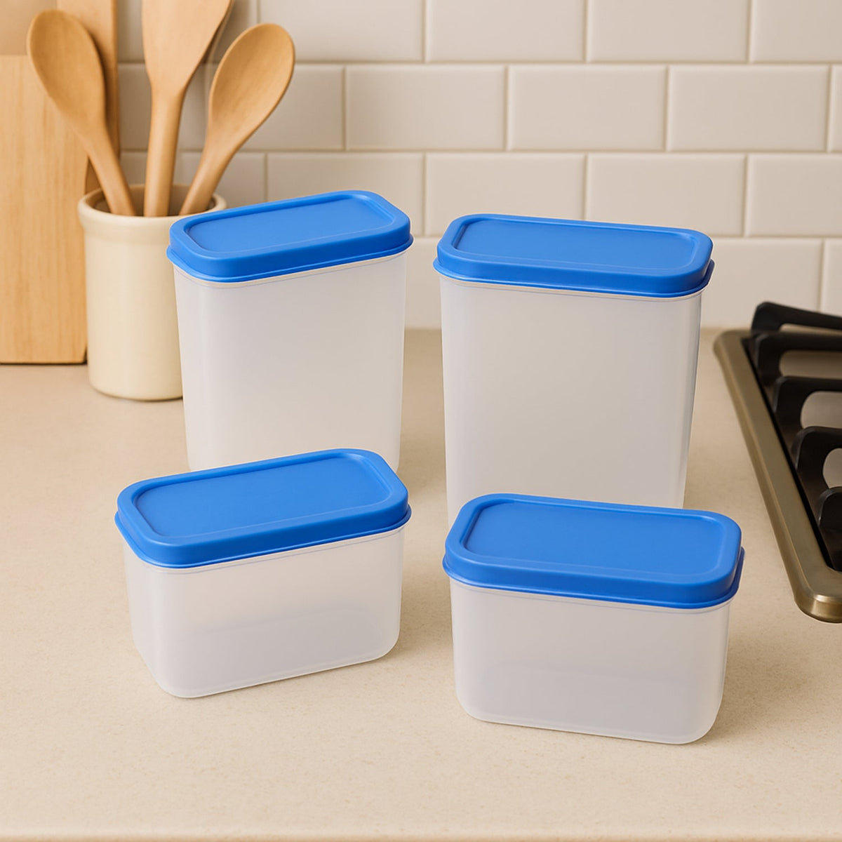 Set of four plastic airtight storage containers with blue lids for kitchen use Main image