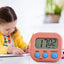 Compact digital kitchen timer with clear, large digits for easy reading.