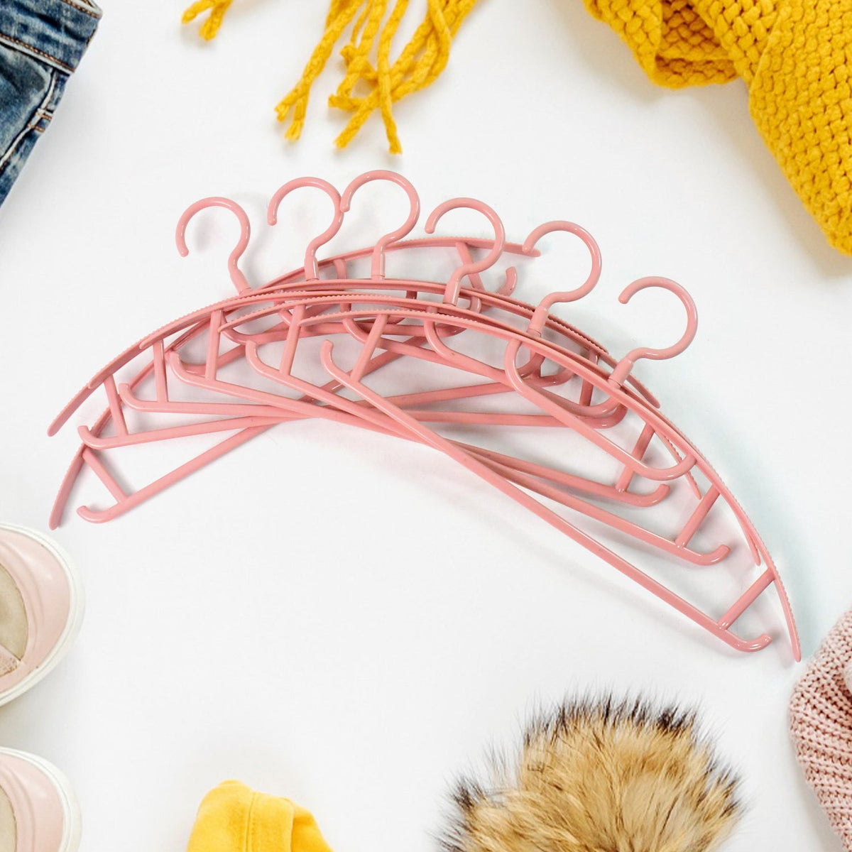 Set of 6 durable plastic cloth hangers ideal for wardrobe organization Main image