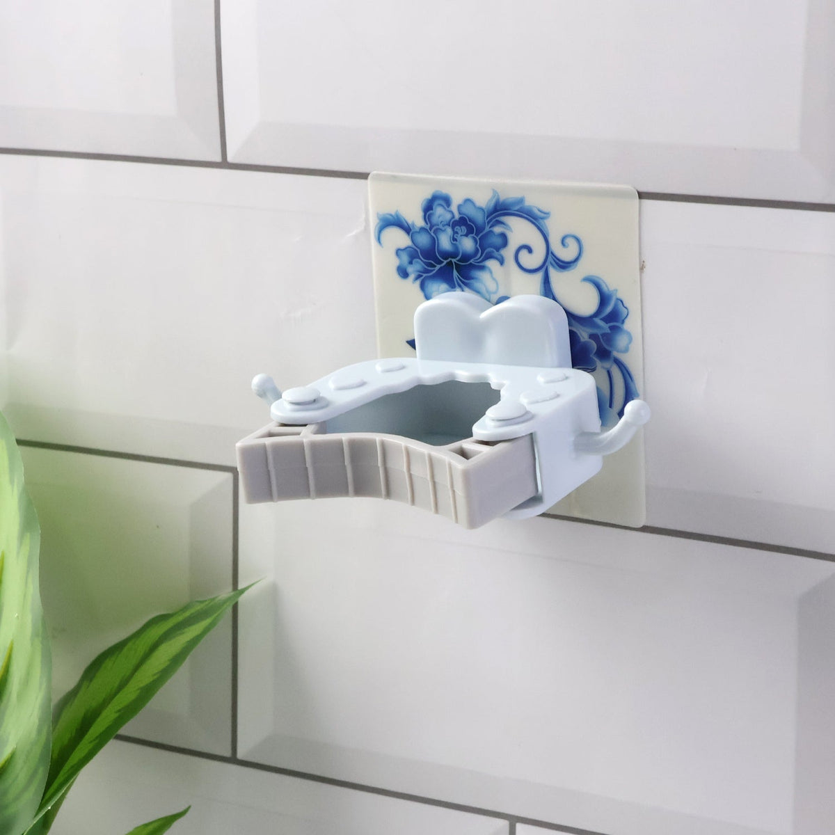 Wall mounted mop and broom holder clip holding cleaning tools on wall Main image