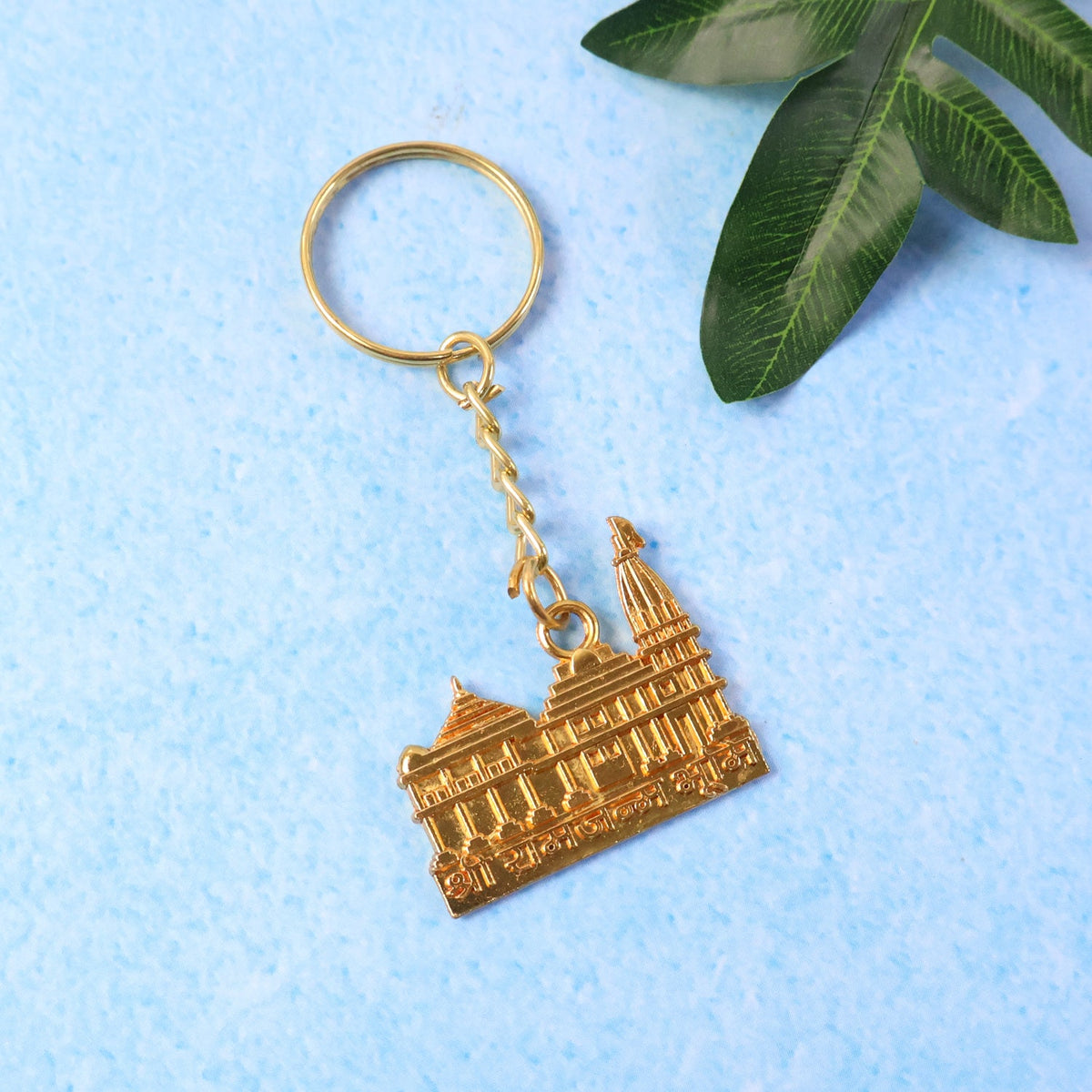 Premium golden metal Ram Mandir keychain showing detailed temple design Main image