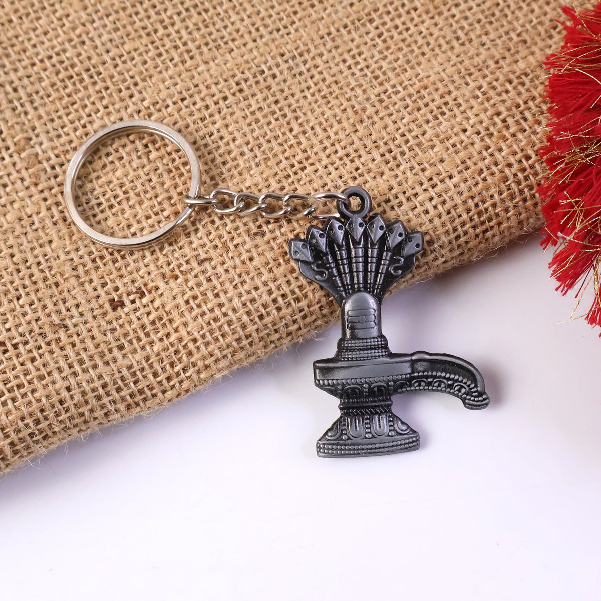 Premium metal Shiva Lingam keychain showing detailed Naag design Main image