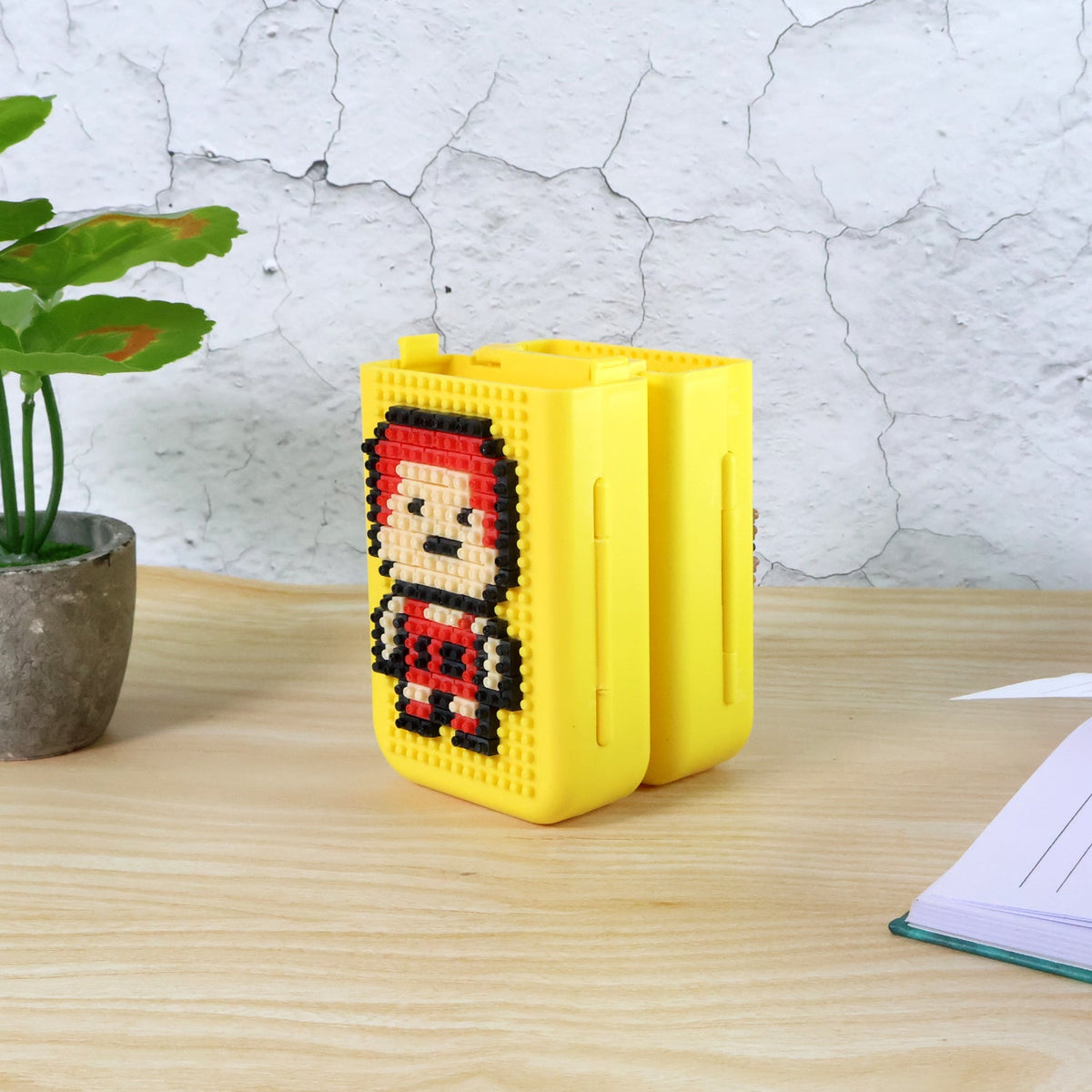 Colourful DIY Pixel Art Pen Stand with building blocks on a vibrant background. Main image
