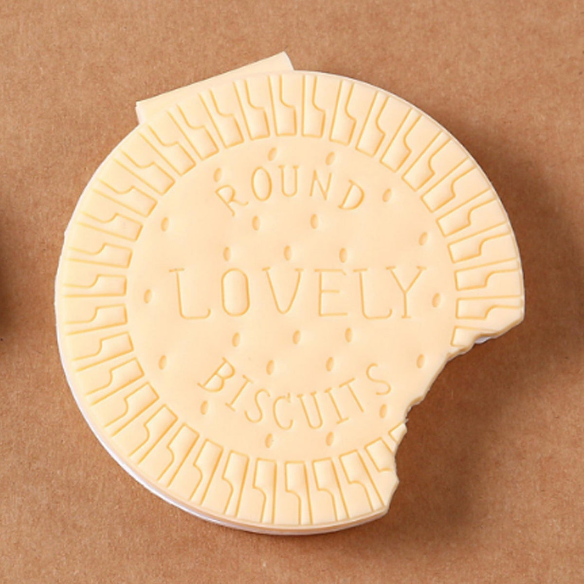 A round, light brown biscuit notebook with a realistic texture, featuring the Papezo logo. Main image