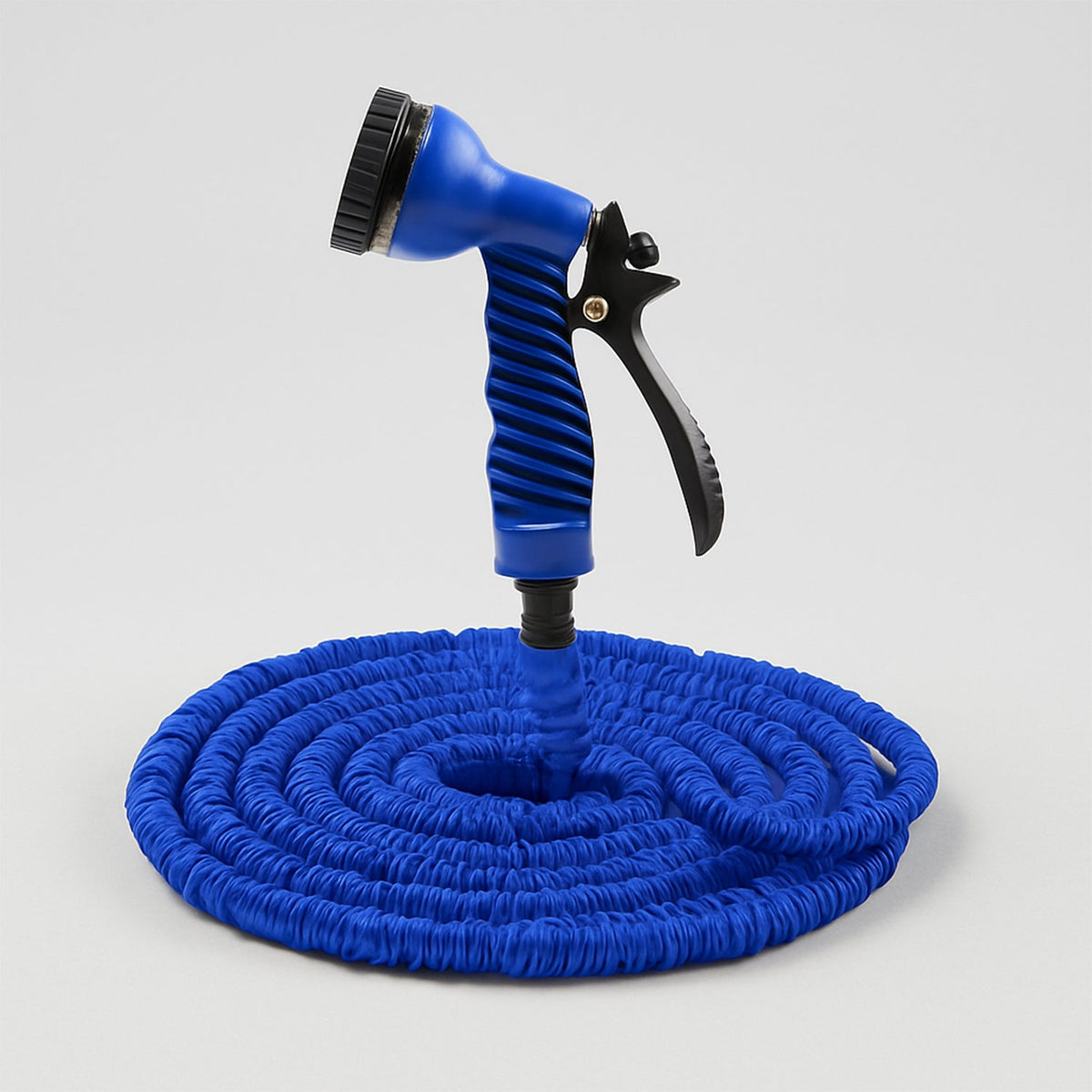 50 Ft expandable hose pipe nozzle with 7-pattern spray gun for garden and car wash. Main image