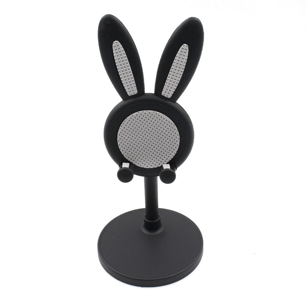 The Bunny Phone Stand in a home office setting, perfect for desk organization.