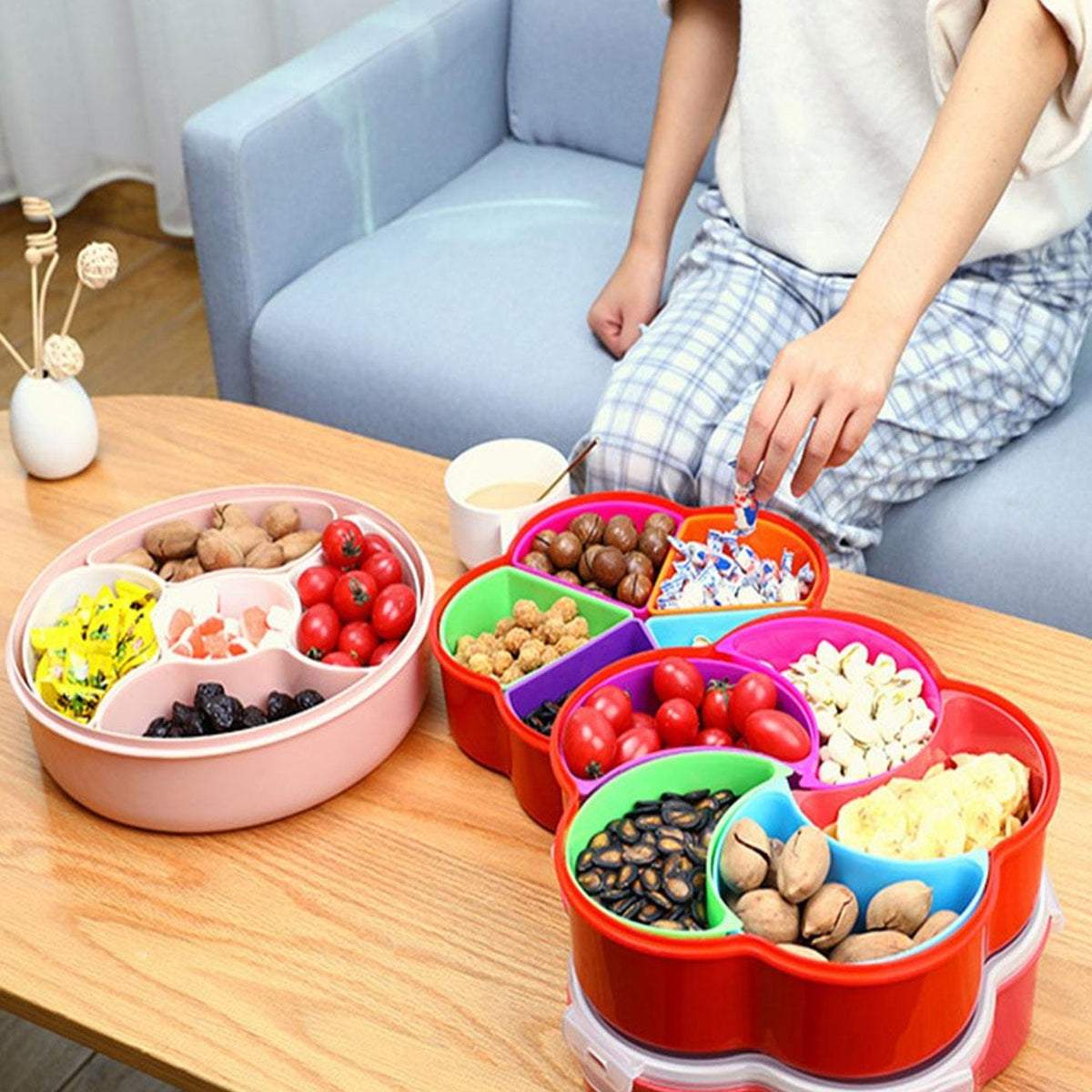 Clear 5 compartment snack box filled with various dry fruits and nuts. Main image