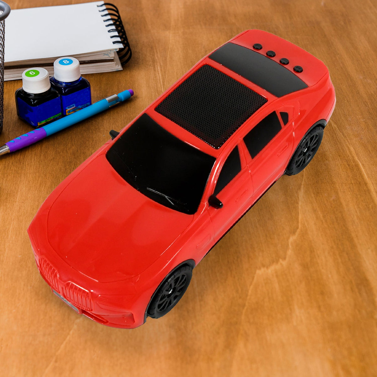 Audila Car Shape Wireless Speaker, showcasing its unique design and LED lights. Main image