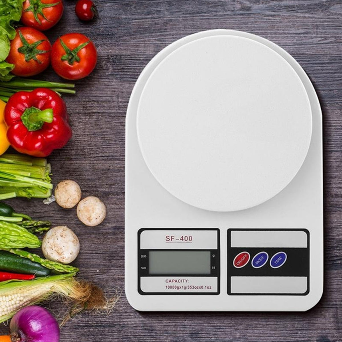 Compact digital kitchen scale with a 10 kg capacity on a white background. Main image
