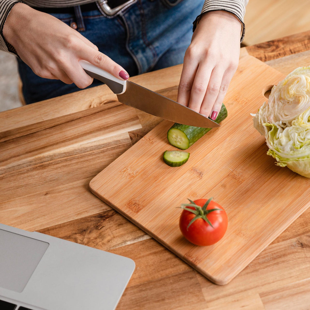 Large bamboo cutting board for kitchen prep, showcasing its smooth surface. Main image
