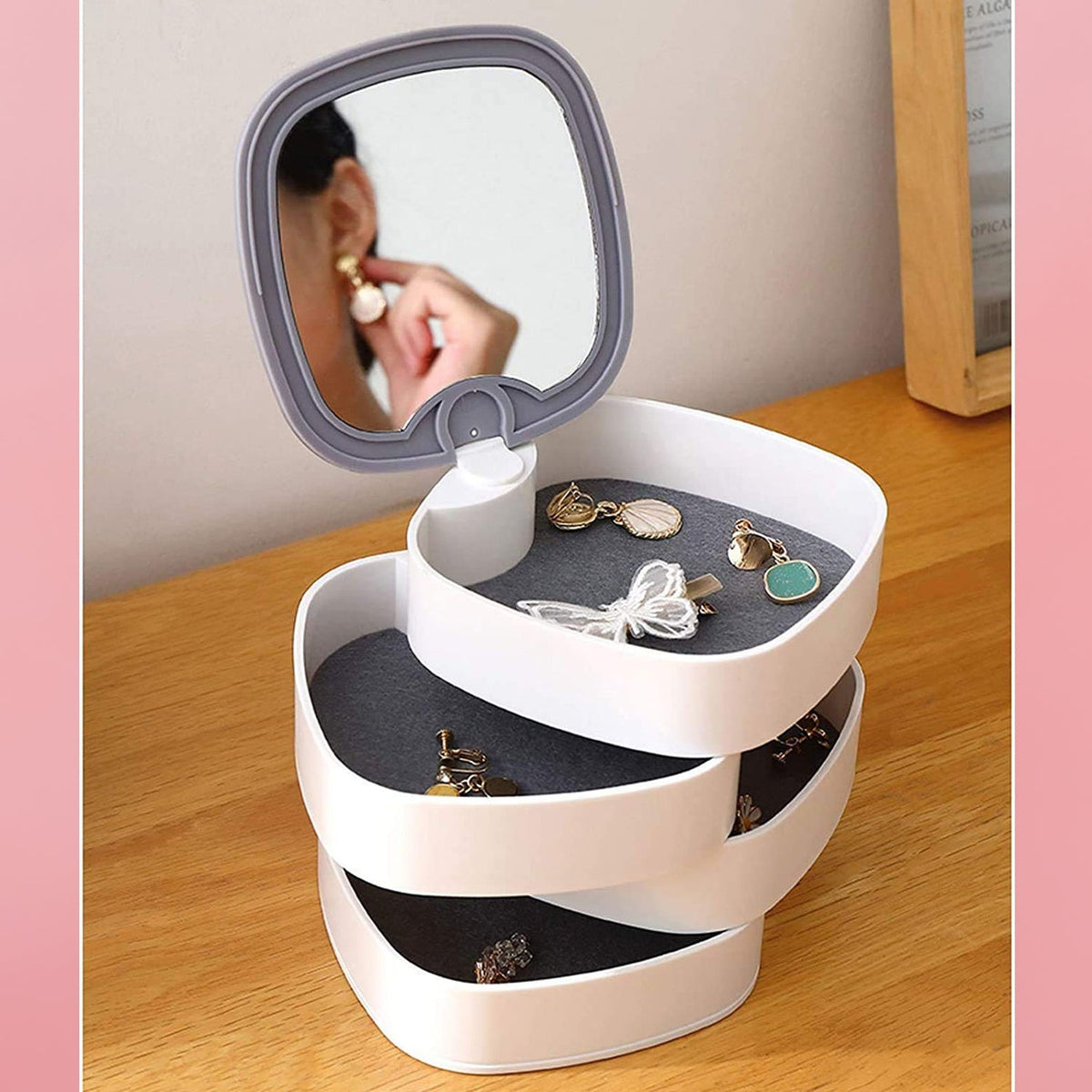 4-layer 360-degree rotating jewellery box with mirror and multicolour compartments India Main image