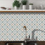 Kitchen backsplash adorned with elegant patterned Peel and Stick Tiles, enhancing the modern decor.