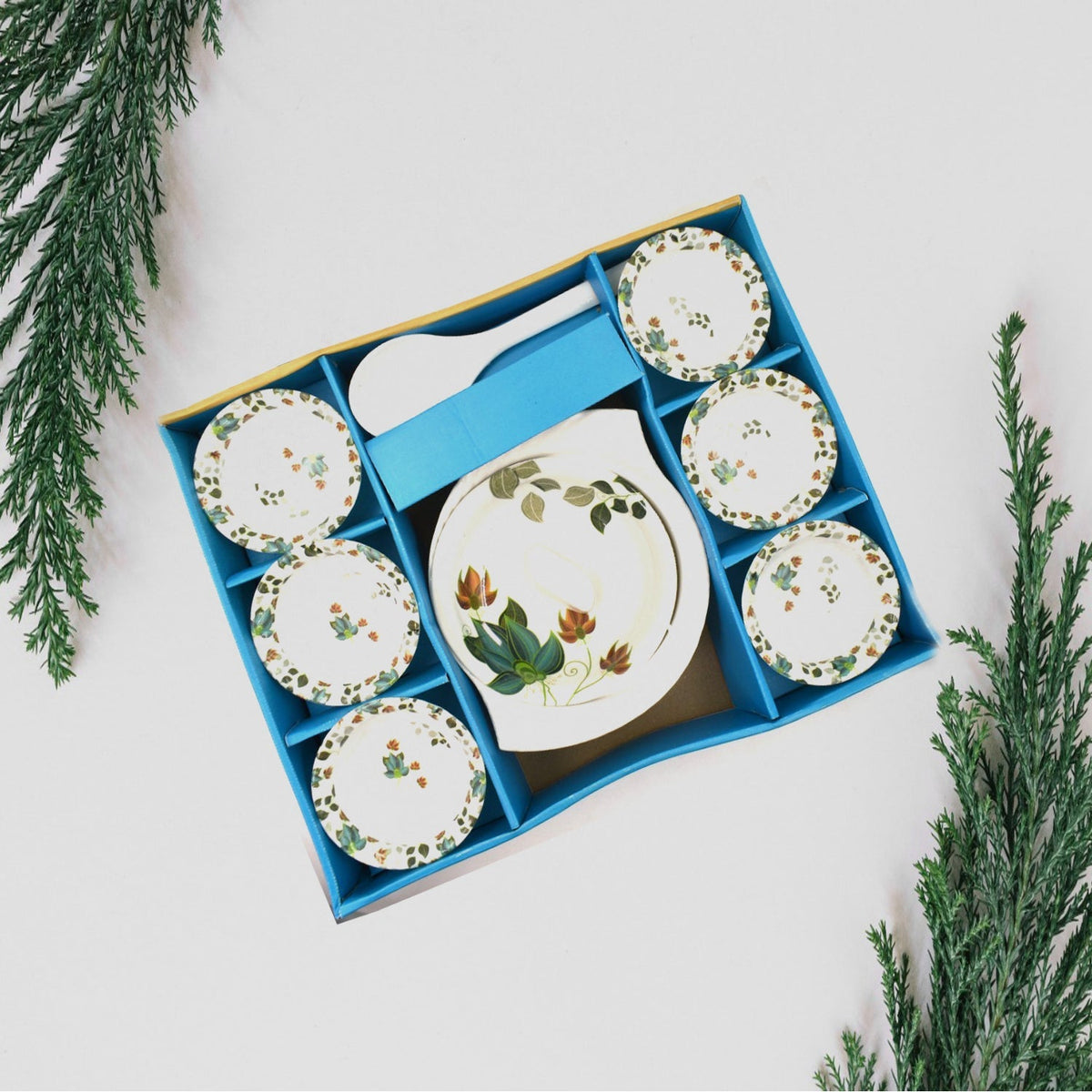 Elegant 9-piece pudding serving set arranged on a table. Main image