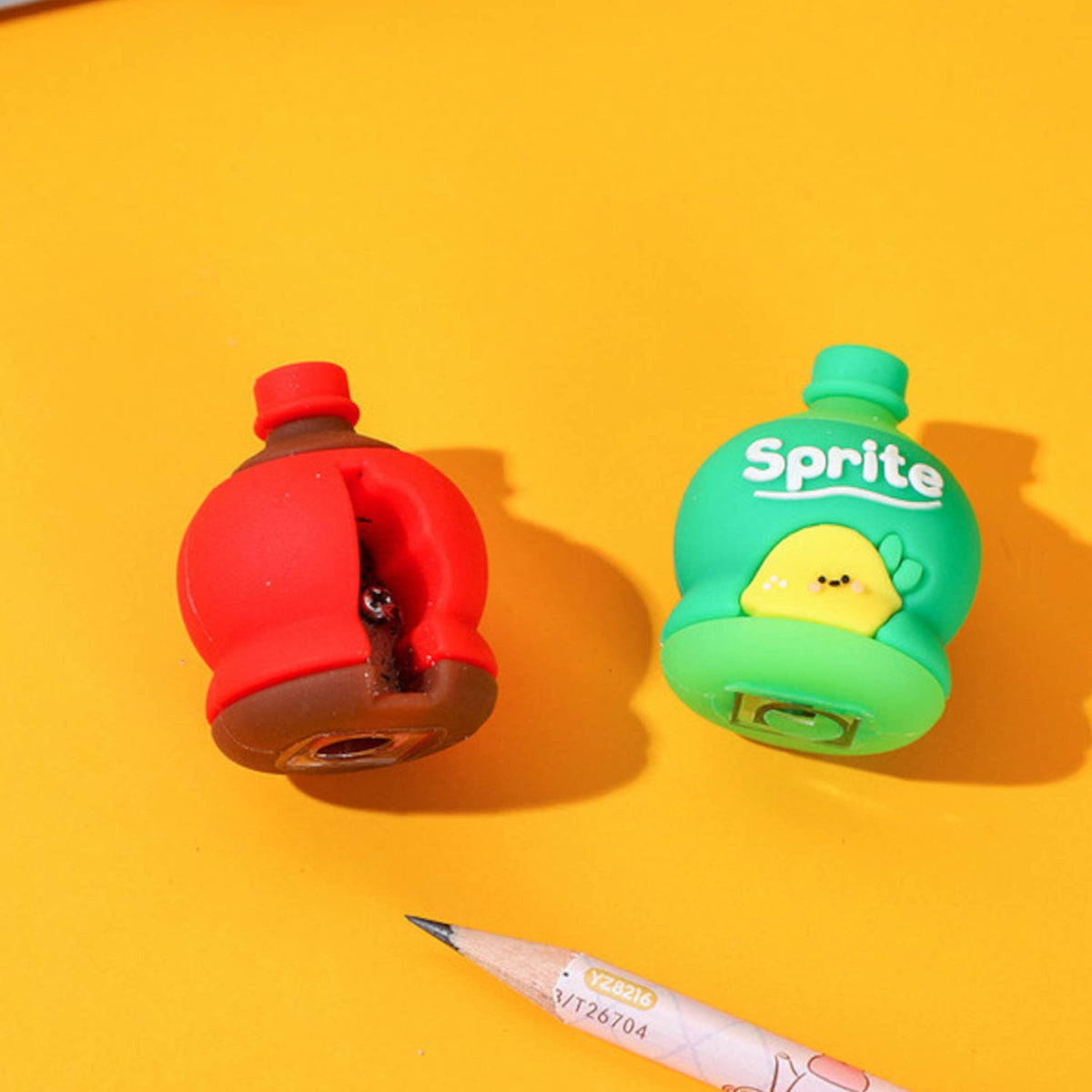 A 3D cold drink bottle shape pencil sharpener and eraser set for kids. Main image