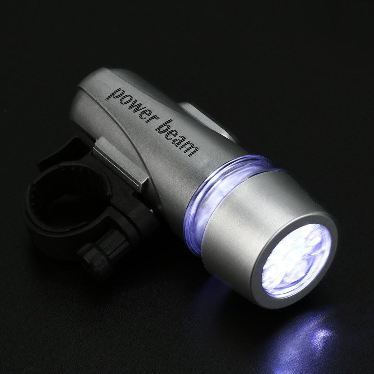 Bright LED bicycle headlight securely mounted on a bike handlebar. Main image